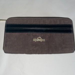 KIPLING Patent Stripe Zip Around Wallet in Espresso
